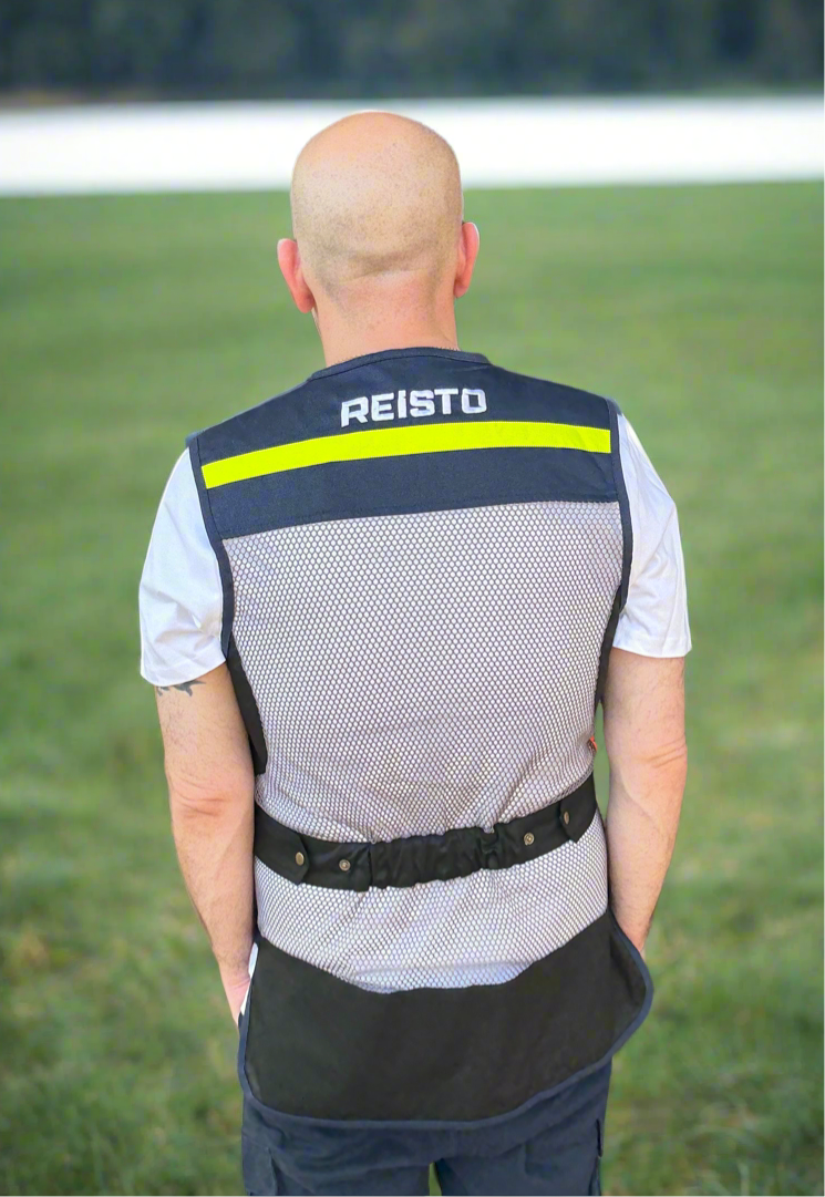 Reisto Skeet Vest Blue and Black Back with person