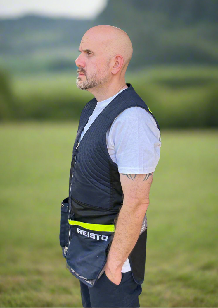 Reisto Skeet Vest Blue and Black Side with person