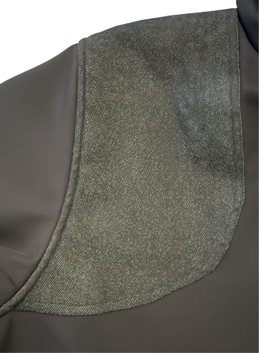 Close-up of REISTO Shooting Jacket shoulder grip panels – designed for improved gun mount and control