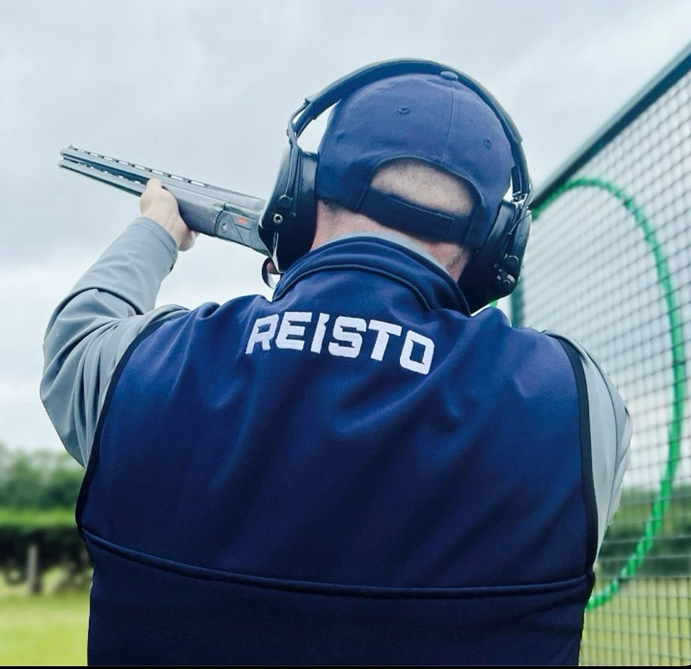 Reisto Softshell Shooting Vest Back View with Cap